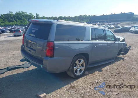 2015 Chevrolet Suburban Lt z USA, uszkodzony, nr VIN 1GNSKJKCXFR646433